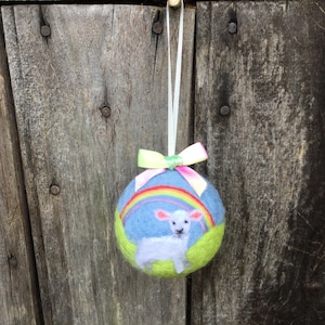Handmade lamb and rainbow hanging ornament needle felted from undyed sheep wool and Merino wool
