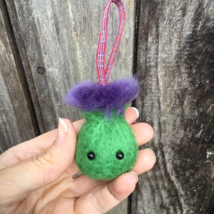 Handmade thistle with eyes needle felted bauble with a tartan hanging ribbon