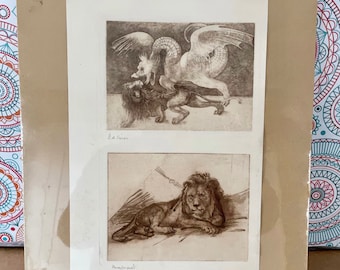 May include: A framed black and white print of two drawings of lions. The top drawing shows a lion being attacked by a griffin. The bottom drawing shows a lion lying down. The print is signed "E.H. Tunis" and "Henri Rousseau".
