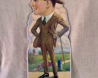Letrero de mostrador de ropa masculina de la década de 1930 tal como se encontró