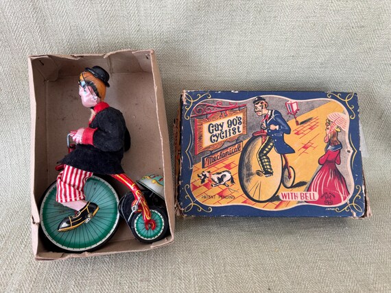 Gay Nineties Cyclist, Wind up Penny Farthing Bicycle Toy, 1950's