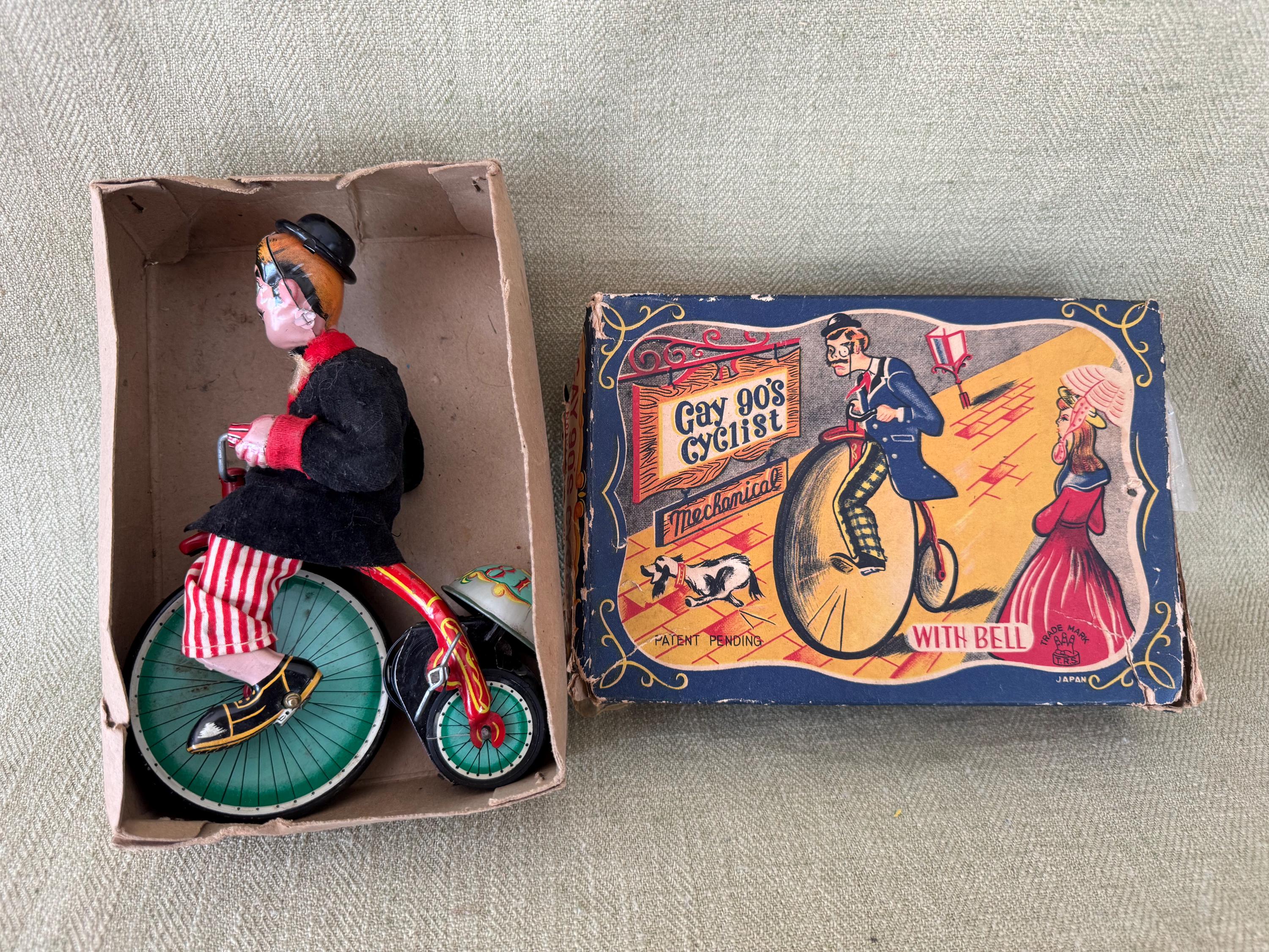 Gay Nineties Cyclist, Wind up Penny Farthing Bicycle Toy, 1950's
