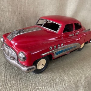Large 1940’s Japan Tin Friction Toy Buick car