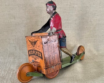 Rare Kid Flyer Newsboy on Scooter Tin Toy, Behrend & Rothschild