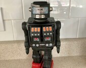 Space Man. Vintage Japanese Battery Op Tin Toy Robot, Horikawa Super Astronaut