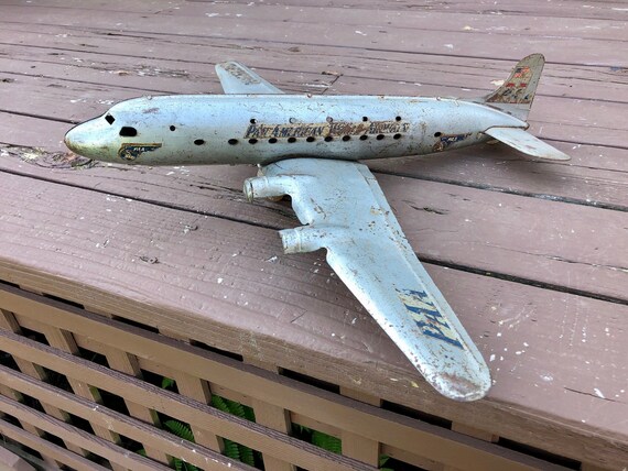 vintage pressed steel toy airplanes