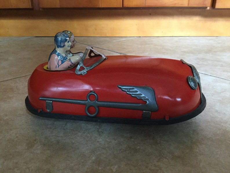 Antique 1930 Lindstrom Tin Wind Up Skeeter Bumper Car Toy with Drivers