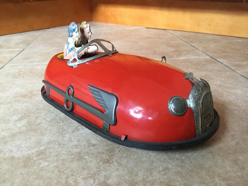 Antique 1930 Lindstrom Tin Wind Up Skeeter Bumper Car Toy with Drivers