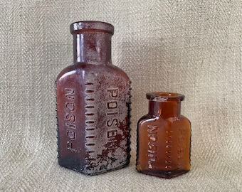 Two Antique Poison Bottles