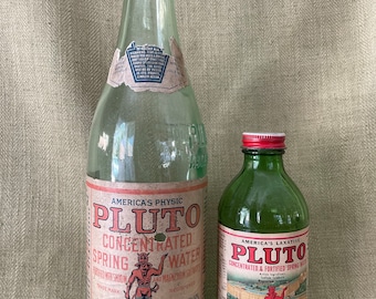 Pair of Antique Pluto Water Laxative Bottles with Devils