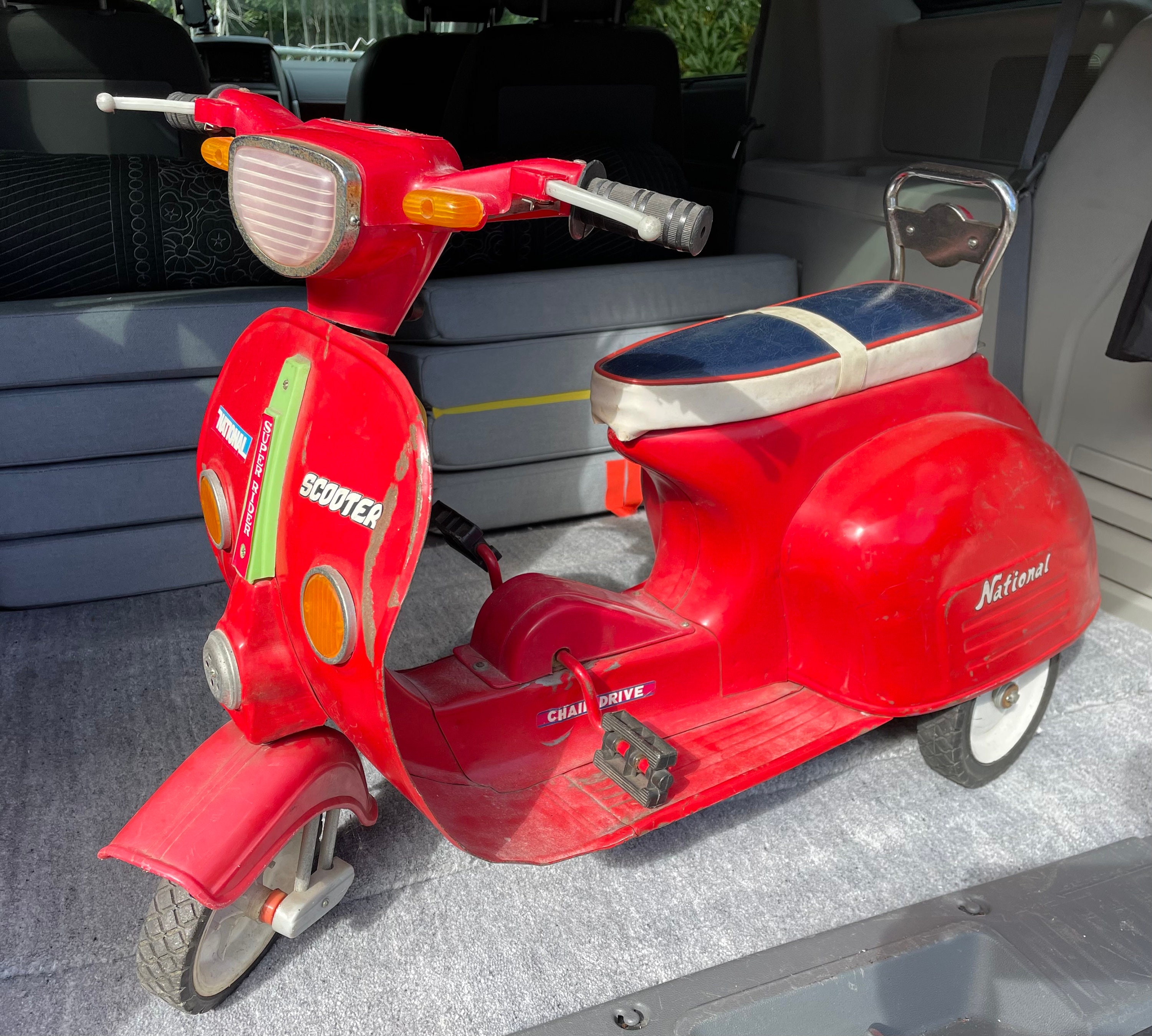 Craftsman styling miniature vespa after painting in home-based
