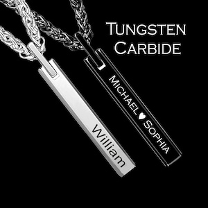May include: Two tungsten carbide necklaces with black and silver chains. The black chain has a black pendant with the text "MICHAEL ♥ SOPHIA" engraved on it. The silver chain has a silver pendant with the text "William" engraved on it.
