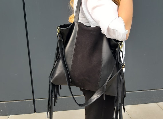 Black purse with tassels 2025