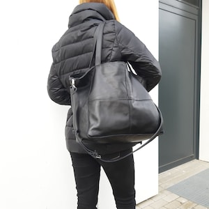 Große schwarze Lederumhängetasche, schwarze Ledertasche, Lederarbeitstasche