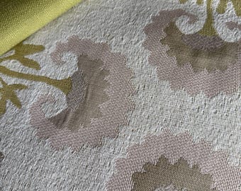 High end woven upholstery fabric in a Suzani style floral weave.  Coordinating green solid fabric for contrast welting for a project!