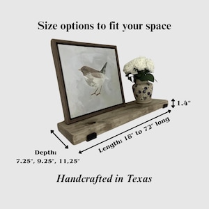 May include: A rustic wooden floating shelf with a framed bird painting and a small vase of white flowers. The shelf is available in lengths from 18 to 72 inches and depths of 7.25, 9.25, and 11.25 inches. The text says "Handcrafted in Texas".