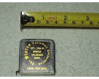 VTG Stores Equipment Corporation Denver, CO Mini cinta métrica de 50 años de antigüedad