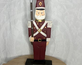 vintage hand-carved folk art wooden toy soldier figurine.