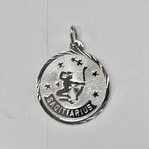 Sagittarius Silver Charm