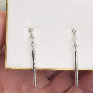 Orecchini pendenti in argento con diamanti