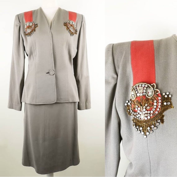 Vintage 1940s Fred A Block gray suit with coral st
