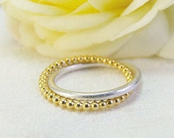 Small bead ring set made of solid silver, bead ring is yellow gold plated