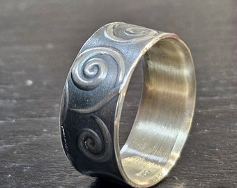 Silver ring with spirals