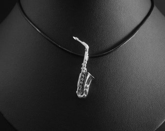 Saxofon i sterlingsilver