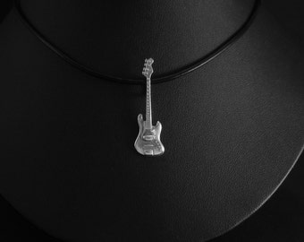 Basgitarr i sterlingsilver