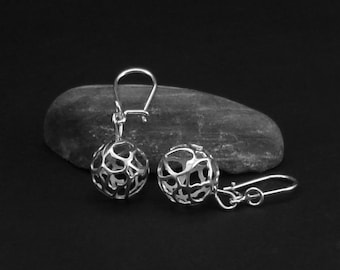 Magiska globörhängen i sterlingsilver