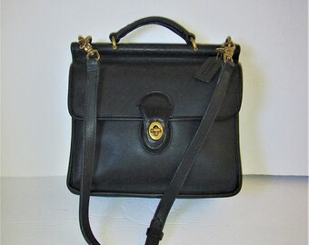 dark green coach purse