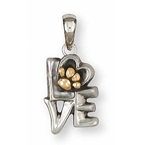 May include: Silver charm pendant with the word "LOVE" spelled out in a stylized font. The "O" is a heart with a gold paw print in the center.