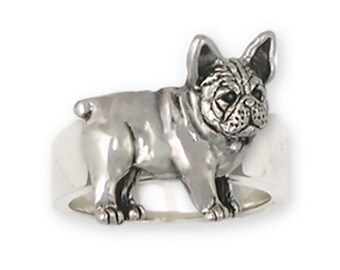 May include: Sterling silver ring featuring a detailed French Bulldog design. The ring is a classic and stylish accessory for dog lovers.
