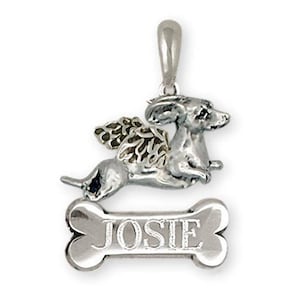 May include: Silver charm of a dachshund with angel wings and a bone engraved with the name "JOSIE".