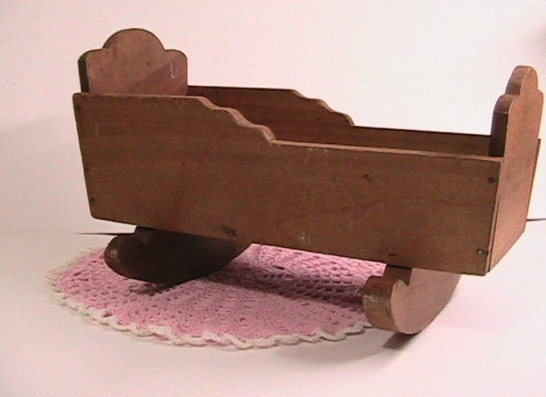 vintage wooden doll cradle