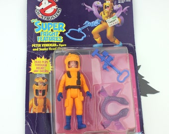 Figura de acción vintage de Peter Venkman de los Cazafantasmas de 1984, con cabeza de serpiente (en caja)