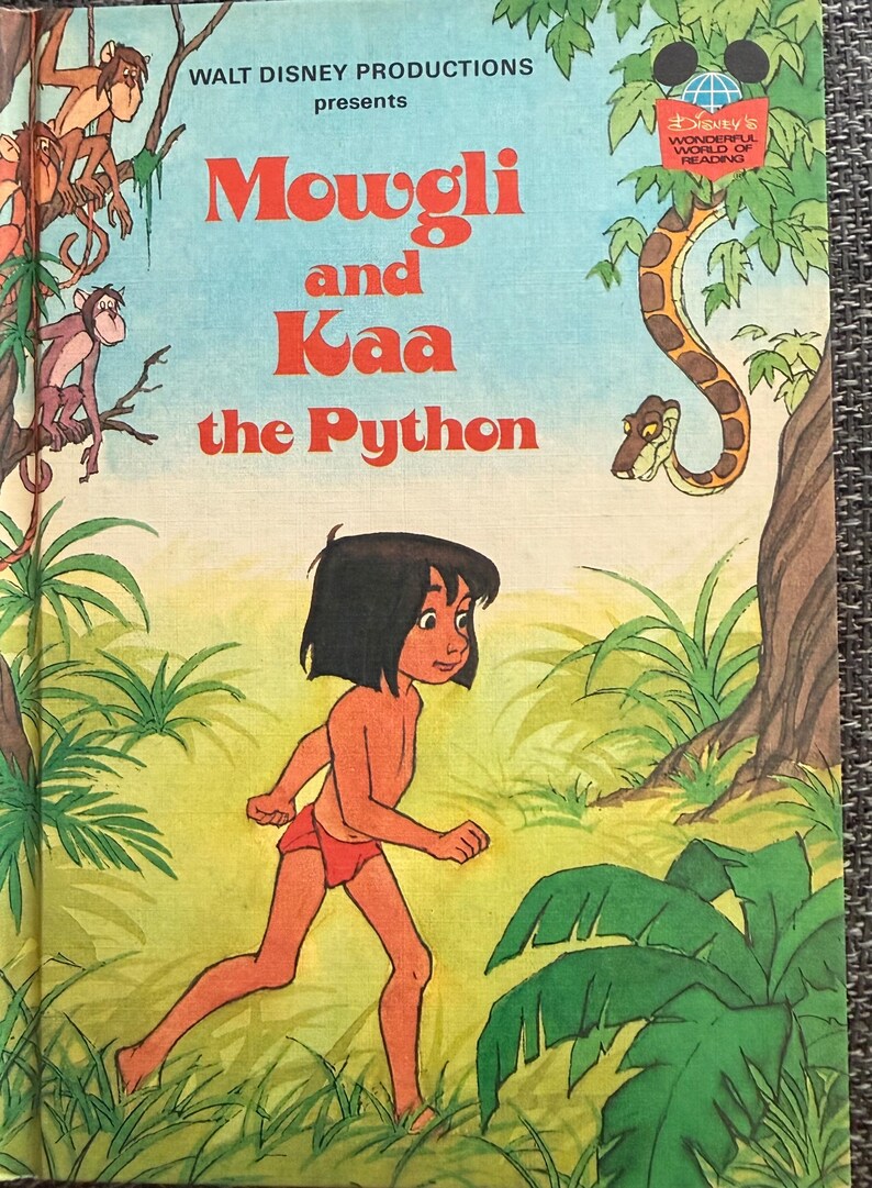 Disneys Wonderful World of Reading-mowgli and Kaa the Python, Goofy ...