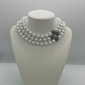 Very Elegant and Fancy, Three Strand, 10mm White and Jet Black Glass Pearls Choker with a Shiny Rhinestone Spacer