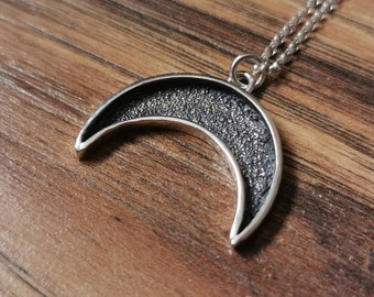 Handmade sterling silver textured crescent moon pendant