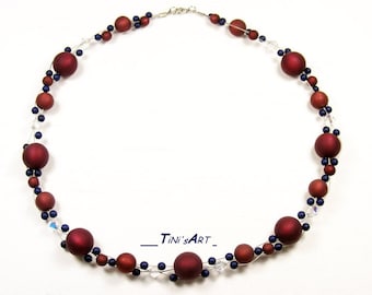 Necklace, burgundy red, blue, Polaris wax beads