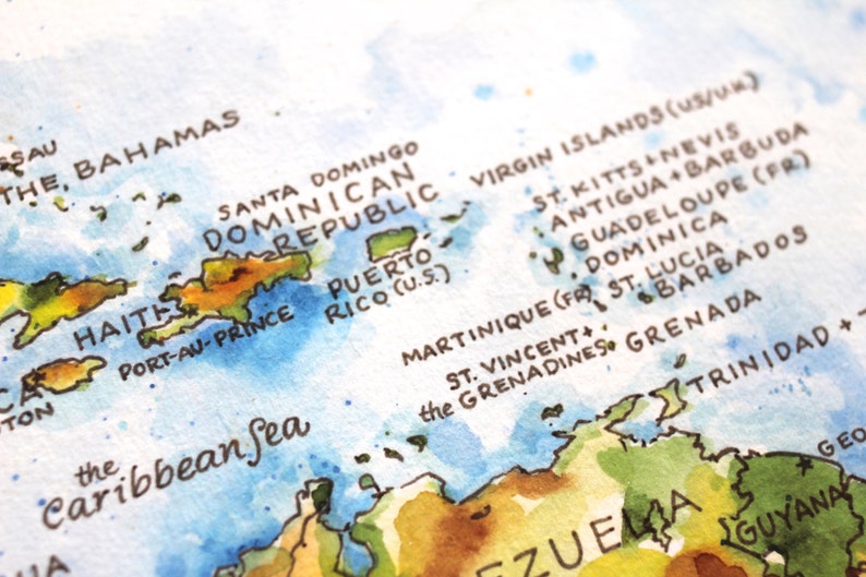 May include: A watercolor map of the Caribbean islands, including the Bahamas, Dominican Republic, Haiti, Puerto Rico, and the Virgin Islands. The map is painted in shades of blue, green, and brown, with the names of the islands written in black.