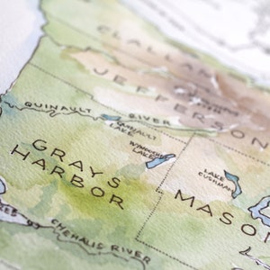 May include: A watercolor map of the state of Washington, showing the location of Grays Harbor, Jefferson, and Mason counties. The map is painted in shades of green, brown, and blue.
