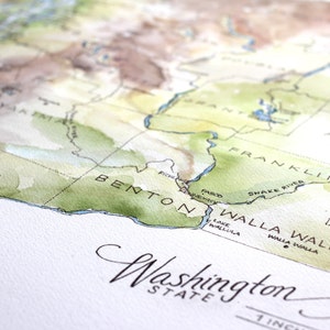 May include: A watercolor map of Washington State, showing the counties of Benton, Franklin, Walla Walla, and Adams. The map is labeled "Washington State" and includes the text "1 inch".