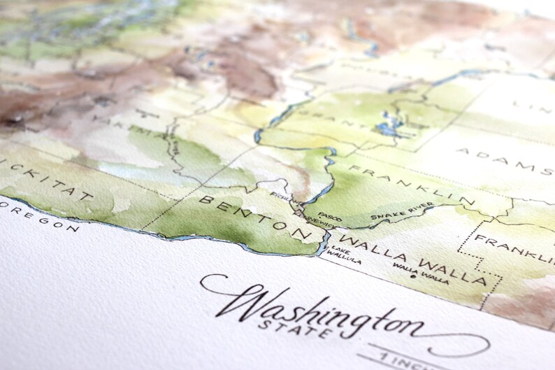 May include: A watercolor map of Washington State, showing the counties of Benton, Franklin, Walla Walla, and Adams. The map is labeled "Washington State" and includes the text "1 inch".