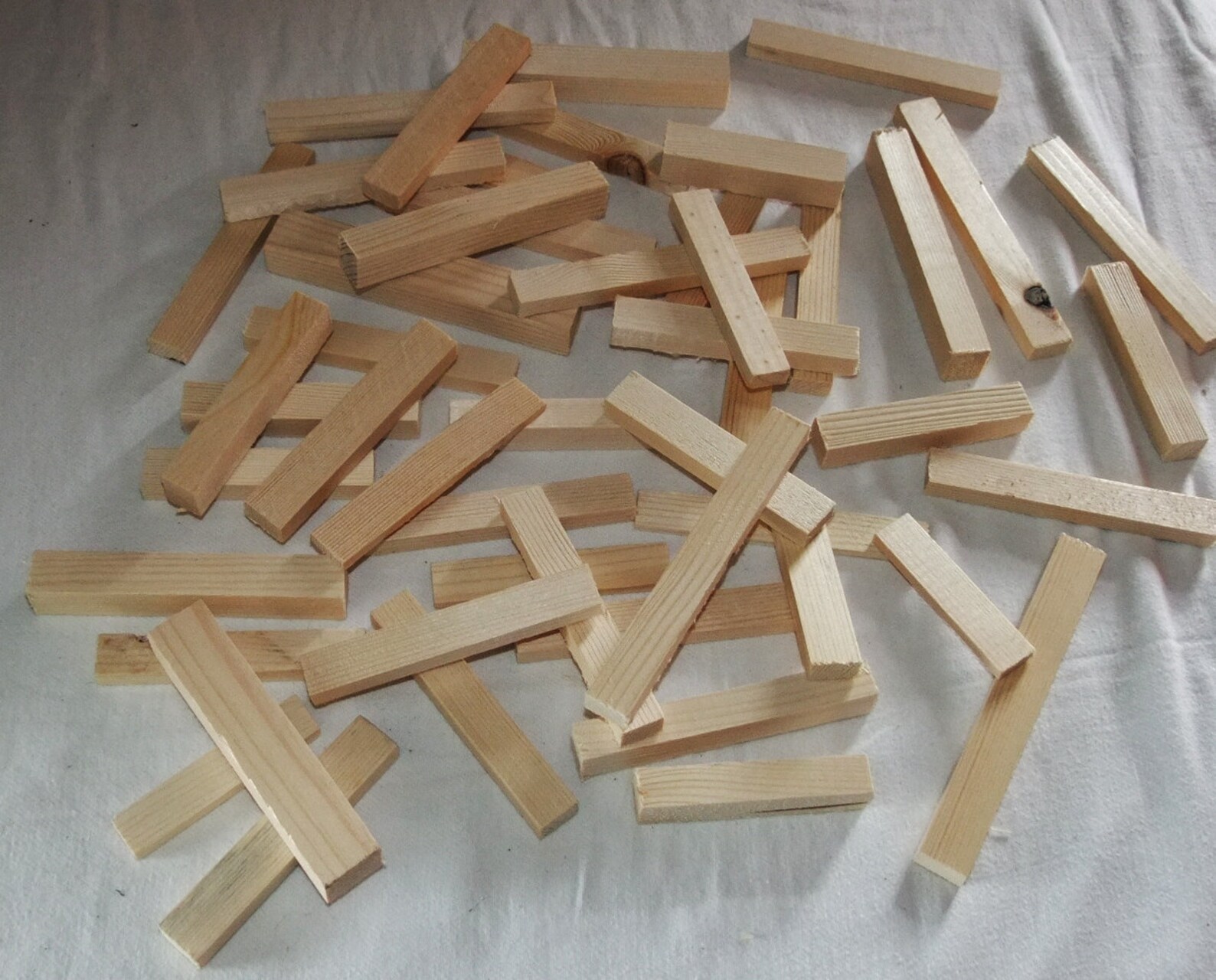 Box of wooden offcuts for child to play with building blocks. Etsy
