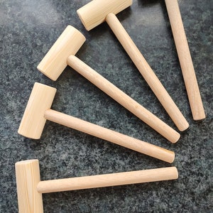Baby or young child wooden toy mallet or hammer for playroom playshool nursery.