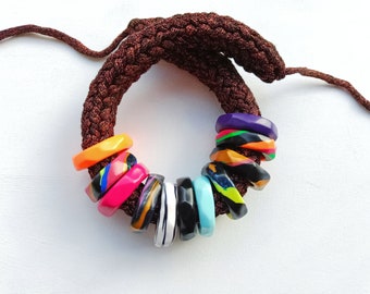 African collar in shiny copper toned yarn and colorful hoops
