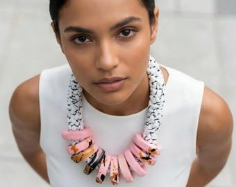 Contemporary statement necklace in pink snake print hoops and soft cotton