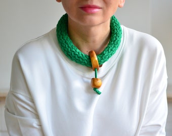 Green statement necklace made of cotton and clay