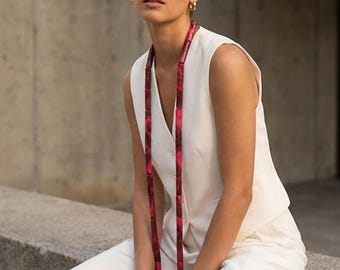 Unique, artsy necklace; geometric style,  burgundy and hot pink pattern